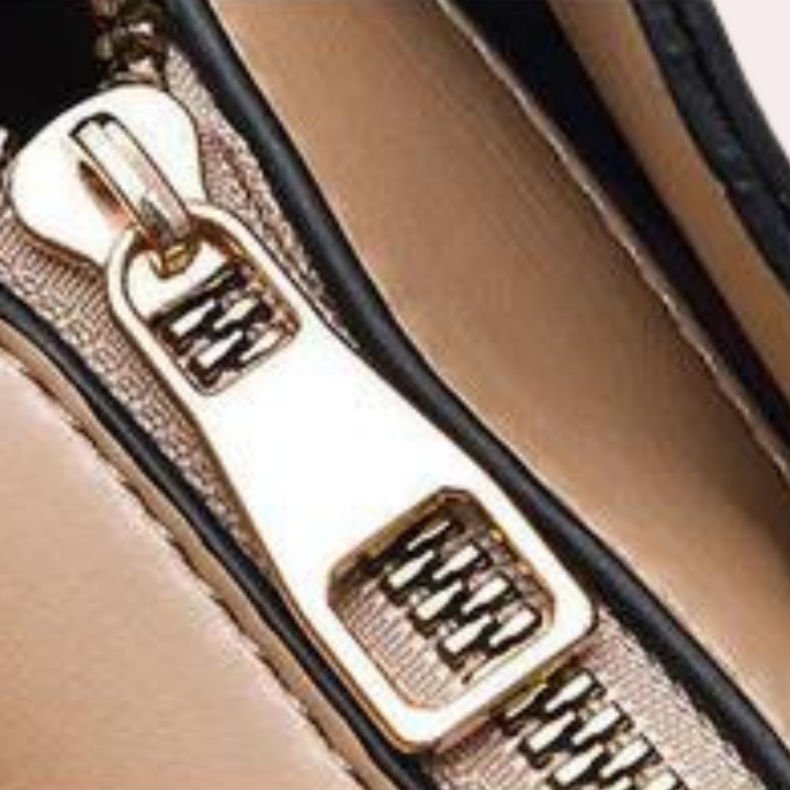 Léora. - Stilfuld Damehåndtaske