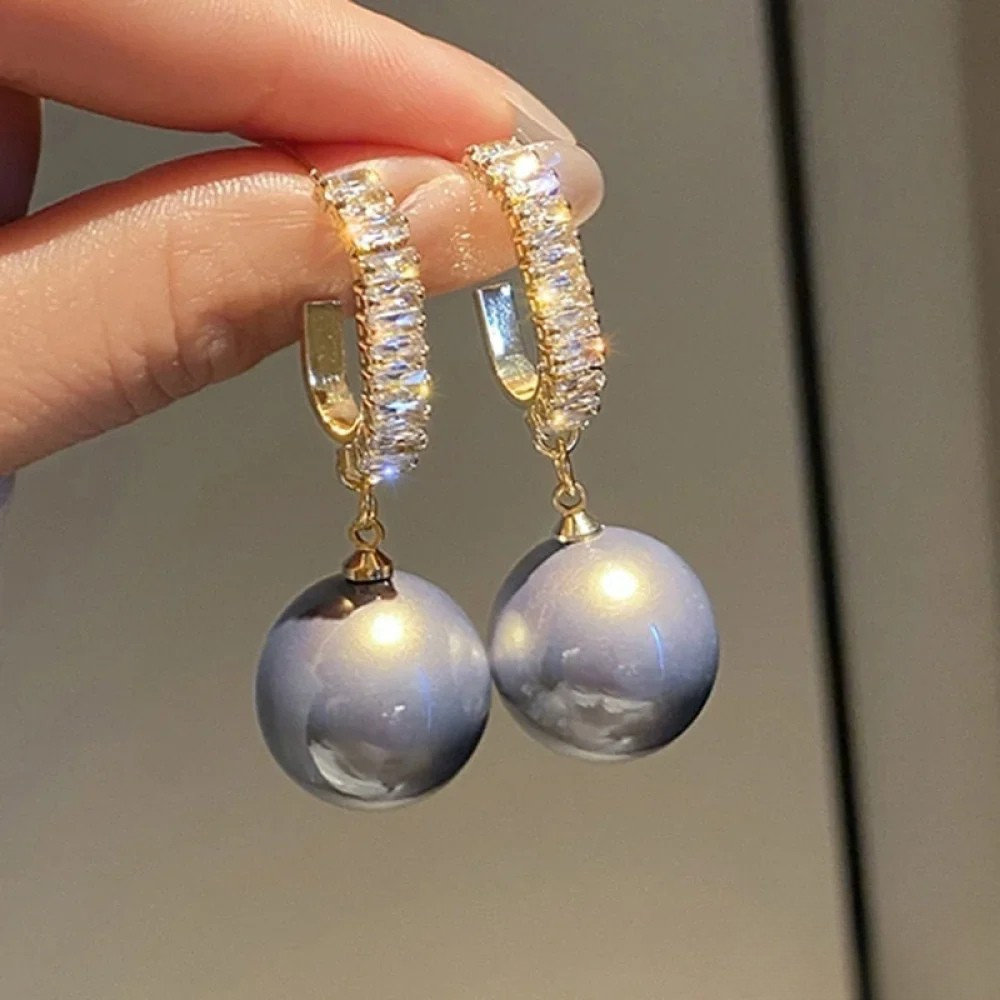 Elegante øreringe med perle og zirkonia