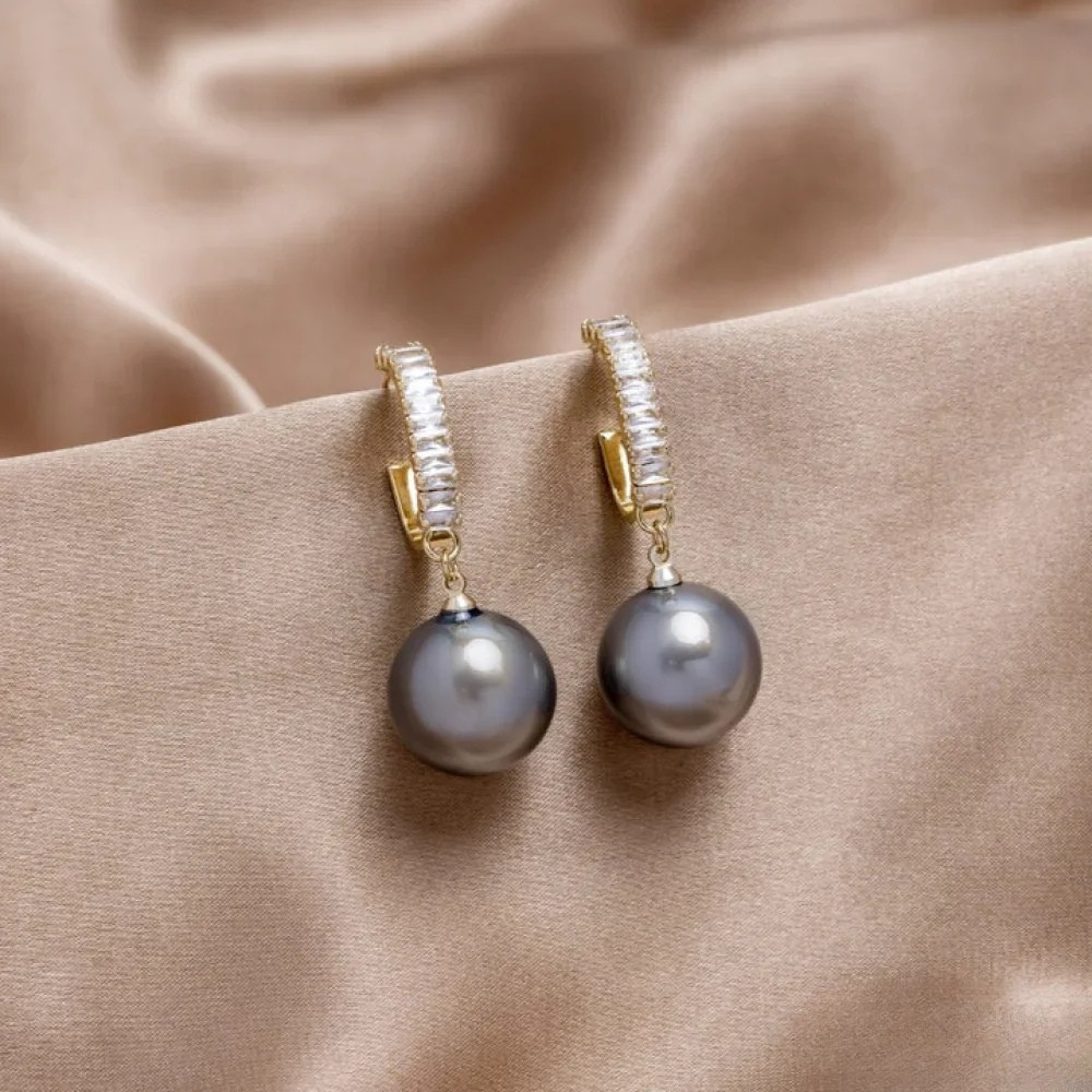 Elegante øreringe med perle og zirkonia