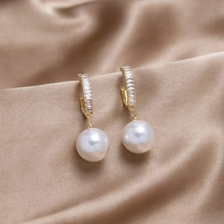 Elegante øreringe med perle og zirkonia