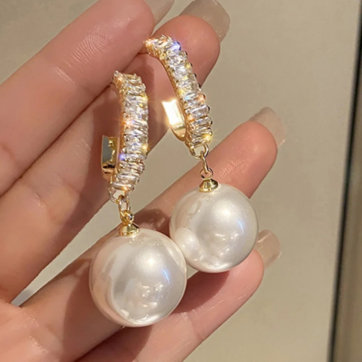 Elegante øreringe med perle og zirkonia
