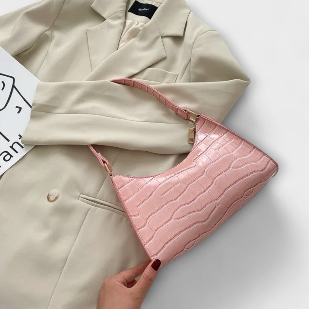 Léora. Skinnende Lædertaske