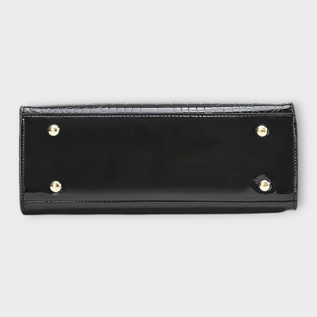 Léora. - Glansfuld håndtaske med krokodillelædermønster